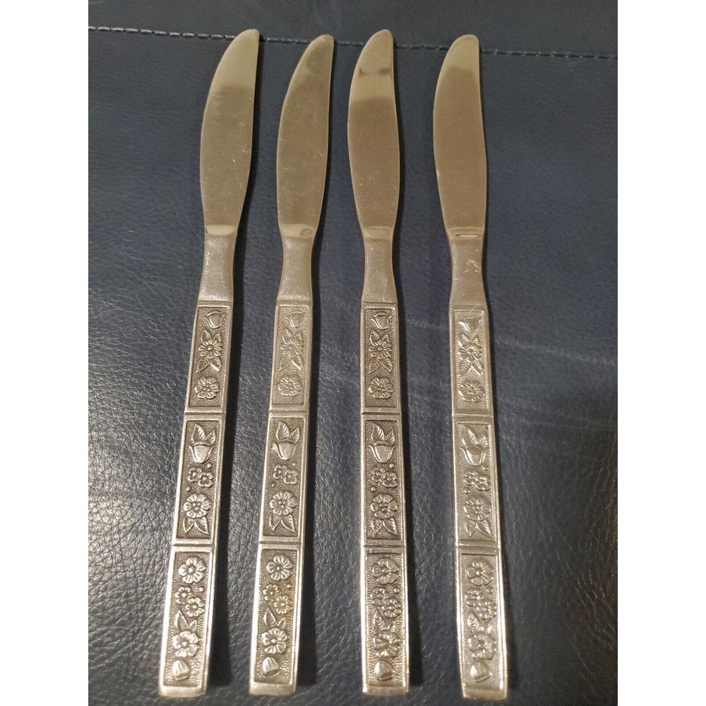 4 Oneida Northland SPRING FEVER Stainless Steel Solid Handle Dinner Knives